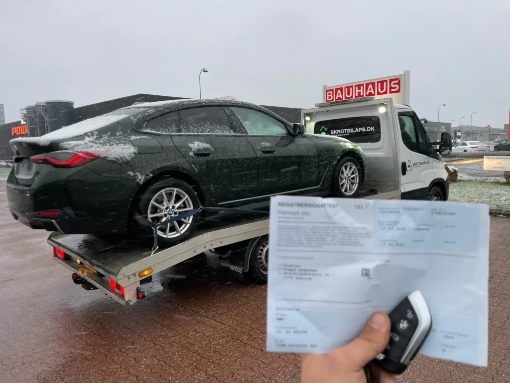 BMW afhentet med nøgle og papirer overdraget